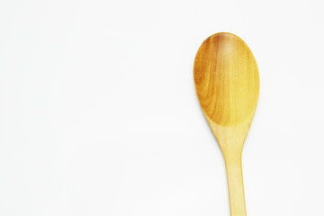 wooden spoon on white background