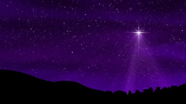 A large Christmas Nativity Star shines down on Bethlehem silhouetted by a purple toned cloudy motion background sky. Loop is perfectly seamless (no fade).