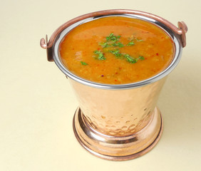 Sambar, a traditional and popular south Indian vegetarian liquid food. It is usually eaten with items like idli and vada.