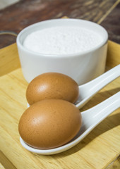 Fototapeta na wymiar bakery main ingredients, egg and powder