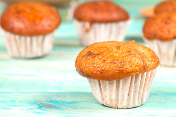 banana cup cake on wood deck .
