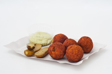 falafel with pickles and sauce