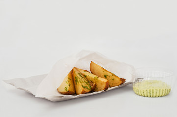 potato rustic with sauce on a white background