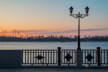 Lanterns on the embankment at dawn