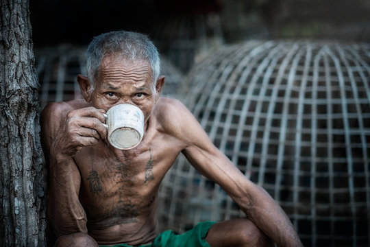 Old man drinking coffee