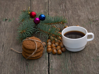 coffee, fir-tree branch, linking of oatmeal cookies and forest n
