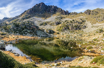 Fototapeta na wymiar Reflection of the in the First Lake of Pessons, Andorra