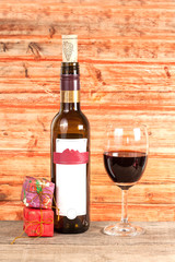 Bottle of wine with glass