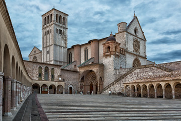 Fototapeta na wymiar Basilica of St. Francis of Assisi (Basilica Papale di San Francesco) with Lower Plazain . Assisi, Umbria, Italy