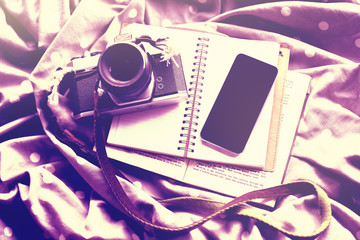 Cell phone with vintage camera, diary and book, mock up