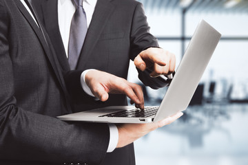 Business partners work with laptop in the office