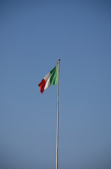 Italian Flag Against Blue Sky