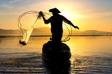Fisherman in action, Silhouette portrait