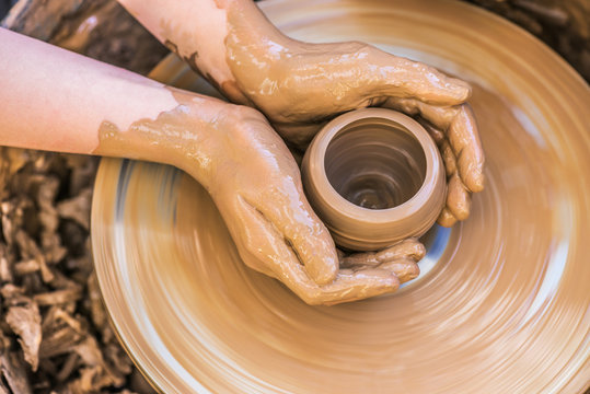 Hands of young potter