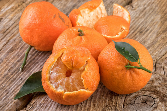 Mandarins Tangerines Fruits on Old Wood