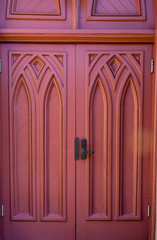 Red Doors with Brass Lock