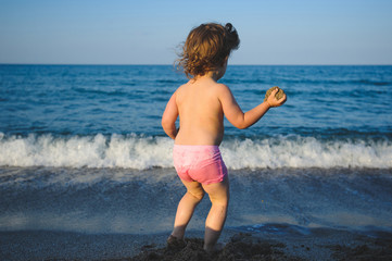 Girl with Sand on Beach