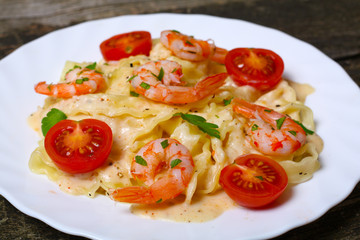 pasta with shrimp, tomatoes, herbs and cream sauce
