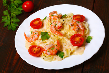 pasta with shrimp, tomatoes, herbs and cream sauce