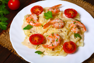 pasta with shrimp, tomatoes, herbs and cream sauce