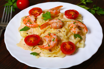 pasta with shrimp, tomatoes, herbs and cream sauce