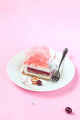 Piece of Coconut Cherry Entremet Cake