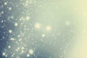 Abstract glittering stars on bokeh background.   Festive blue an