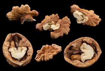 Walnut fruit on black