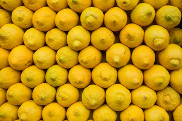 Stack of ripe produce market lemons