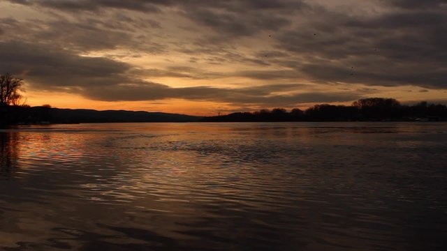 Sunset over Danube river; handheld footage; no people; bautiful colors; 