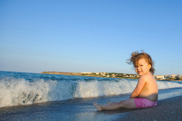 Girl Sitting on Beach