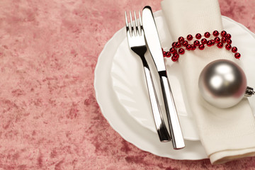 Christmas dinner table. Traditional Christmas decorations. Romantic table setting.