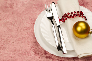 Christmas dinner table. Traditional Christmas decorations. Romantic table setting.