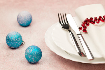 Christmas dinner table. Traditional Christmas decorations. Romantic table setting.