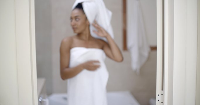 Young Woman Wrapped In Towels