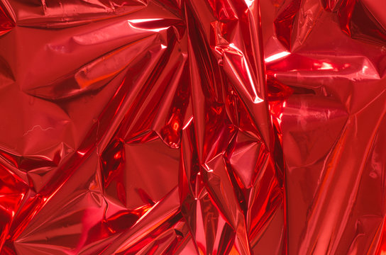 Close Up Of Red Aluminum Foil Texture Background Stock Photo, Picture and  Royalty Free Image. Image 26926515.