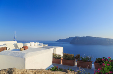 Beautiful relax sea view terrace with white sofa, Santorini island, Greece