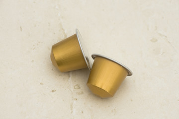 Coffee's capsule on modern background