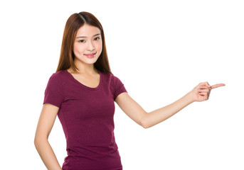 Asian Young Woman showing finger point aside