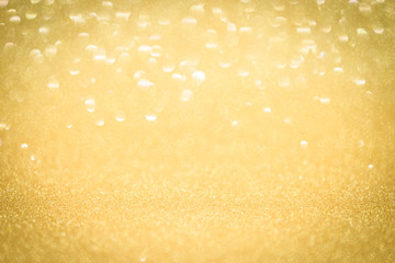 Abstract christmas and new year gold blinking background.