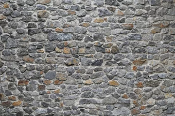 Foto op Plexiglas Steen Oude stenen gelaagde muur