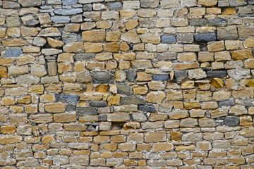 Old stone layered wall