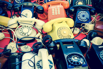 Many vintage phones retro style photo