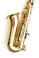 Fototapeta na wymiar Golden saxophone isolated on white background, close up