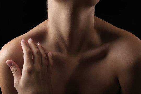 View on woman's neck, collarbone and shoulders, close-up