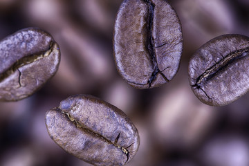 falling coffee beans closeup