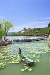 Worker on a boat in Kunming Lake, Summer Palace, Beijing, China