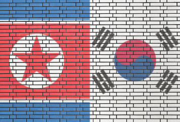 North- and South-Korea flags on a wall