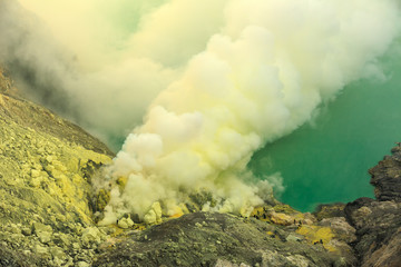 Kawah Ijen volcanic crater lake and toxic sulfur fume,Indonesia