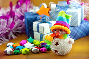 Snowman and gift box with christmas tree and small star paper